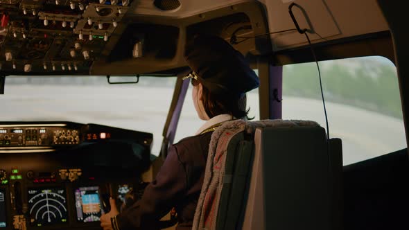 Portrait of Woman Copilot Flying Airplane with Captain in Cockpit ...