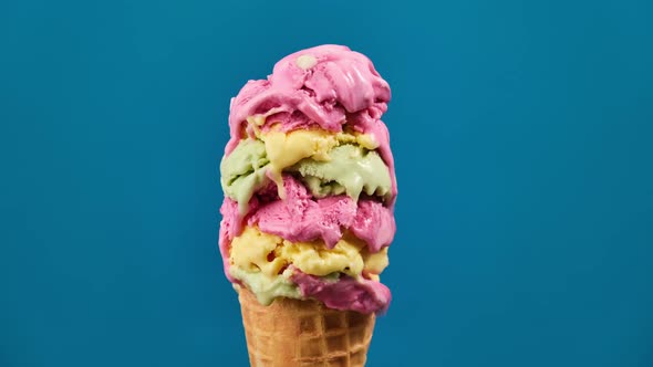 Ice Cream with Different Colors in Waffle Cone Melting alt