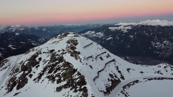 Snowy Mountain Skilifts and Furniculars and Skislopes in Austrian Alps Drone Flyover the Mountains