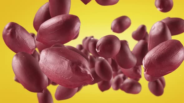 Flying of Peanuts in Yellow Background alt