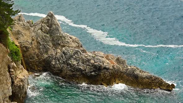 Turquoise Sea And Rocks