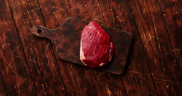Raw Meat on Chopping Board alt