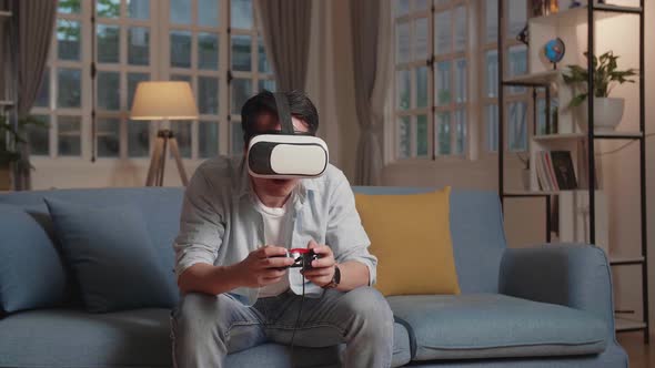 Young Man Gamer Take Off The VR Headsets When Game Is Over, Feeling Disappointed alt