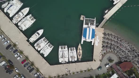 White Boats, Yachts and Catamarans Parked in Marina