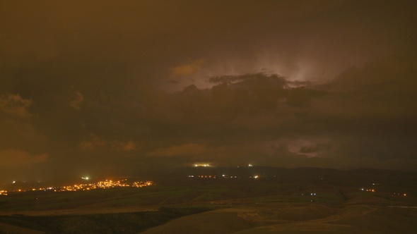 8K Lights of Lightning and Thunderbolts in Storm Clouds in Night Sky
