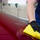 Man After Washing Wipes Red Car with a Rag at Car Wash - VideoHive Item for Sale