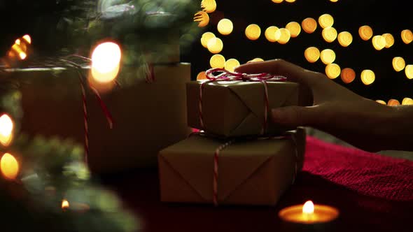 Putting Christmas Gift Box alt