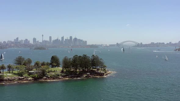 Yachts and Boats in Sydney Harbor in the Summer Flying over Shark Island alt