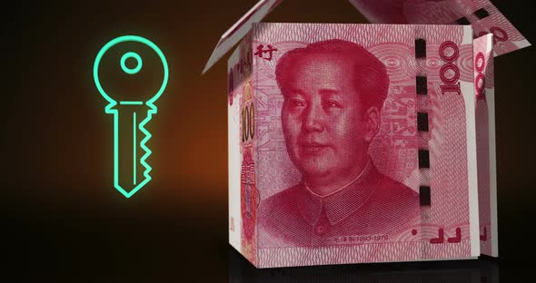 China Yuan 100 CNY money banknotes paper house on the table
