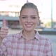 Thumbs Up By Excited Young Woman Outdoor - VideoHive Item for Sale