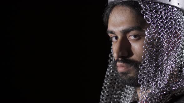 Armored Byzantine Warrior. Black background. alt