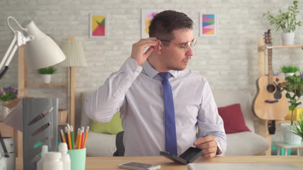 Surprised and Glad Hard of Hearing Man for the First Time Wearing a Hearing Aid Close Up alt