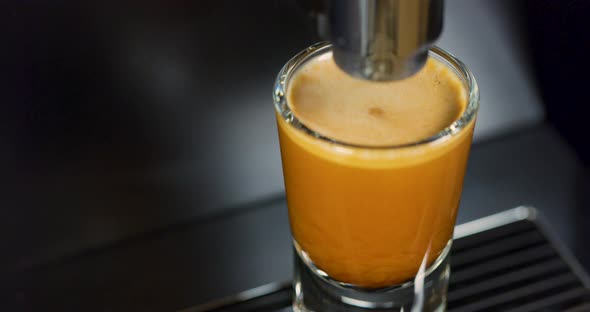Close-up of Strong Espresso Making at Exclusive Coffee Machine