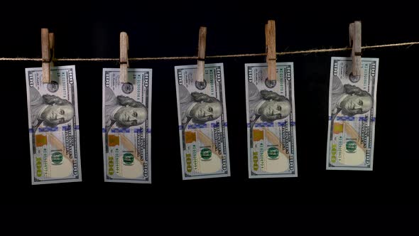 Dollars Dry on a Clothespin Rope alt
