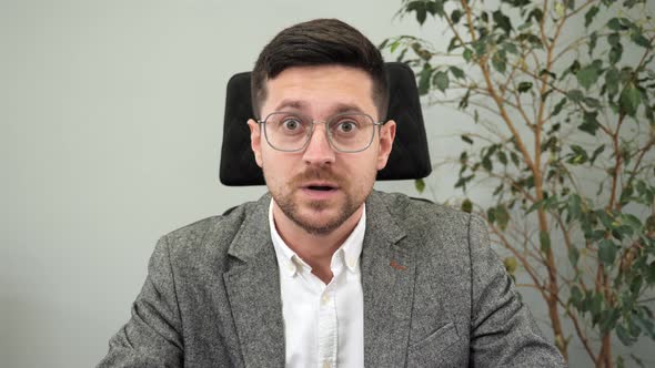 Businessman Coach Looking to Web Camera Laptop Webinar Online Virtual Meeting alt