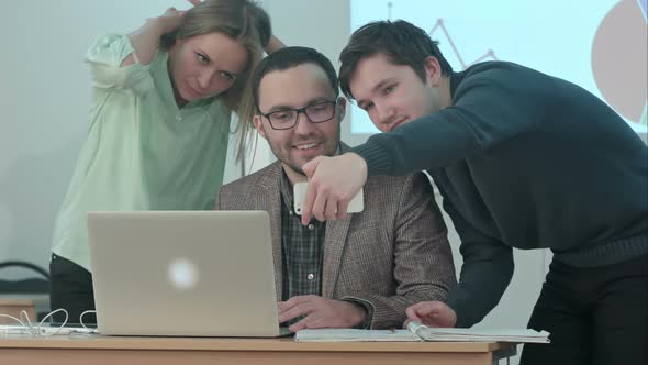 Students Taking a Selfie with Their Teacher in Classroom During a Break alt