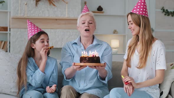 Happy Excited Beautiful Three Women Age Generations Family Old Grandmother Young Mom and Little alt