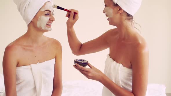 Beautiful Woman Having a Facial Treatment at Spa alt