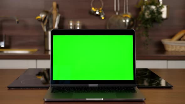 Green Screen Laptop Standing on Kitchen Table Computer with Chroma Key ...