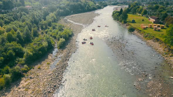 Aerial View Rafting Many Boats on a Mountain River for Rafting alt