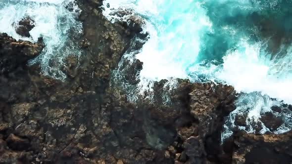 Big blue wave splash near the beach in the ocean - summer vibes and vacation concept