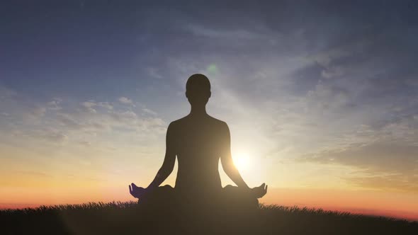 Man In Yoga Pose At Sunset