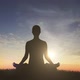 Man In Yoga Pose At Sunset - VideoHive Item for Sale