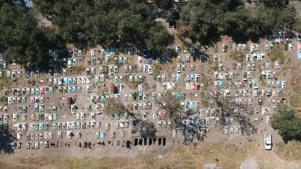 drone shot of a a full cemetery in latin america during strongest pandemic time of covid-20 alt
