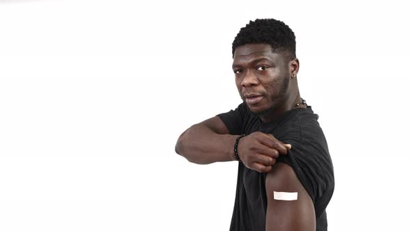 Vaccinated Black Man Showing Arm White Backround Isolated  Portrait Shot alt