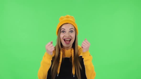 Portrait of Modern Girl in Yellow Hat with Shocked Surprised Wow Face Expression and Having Fun alt