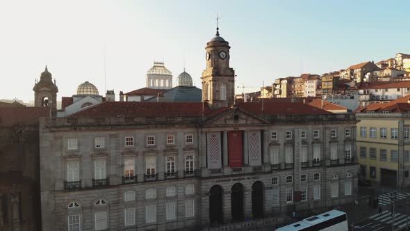 Stock Exchange Palace (Palácio da Bolsa) in Oporto, Portugal - Ascending Aerial Reveal shot alt