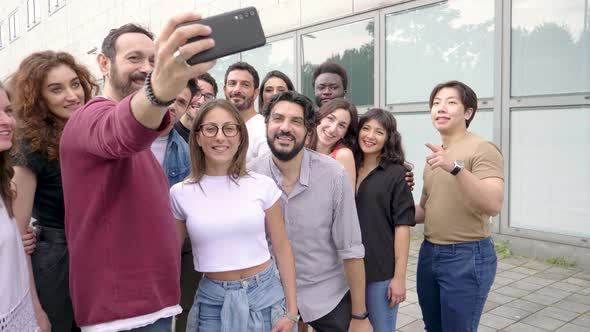 Happy group of best friends taking a selfie