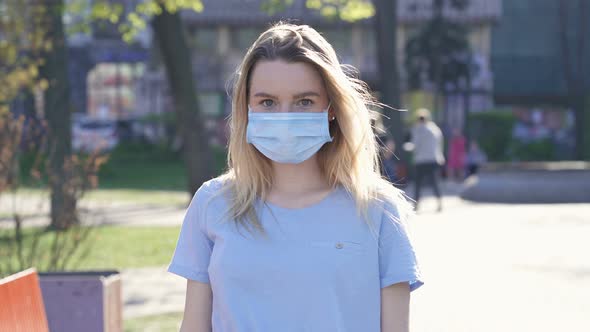 Woman with  Face Mask at The Street