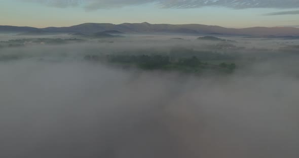 Rise From The Mist Over The Lake