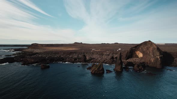 Drone Over Sea Towards Coastline And Landscape Of KeflavK alt