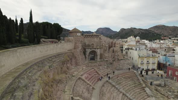 Drone view reveals stunning ancient architecture of Roman amphitheater; Spain