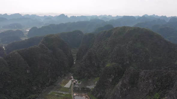 Aerial view of Ninh Binh region, Trang An Tam Coc tourist attraction, UNESCO World Heritage Site, Sc alt