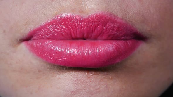 Female Beautiful Lips, Lips Pursing. Close-up of Full Lips, White Beautiful Teeth.