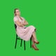Woman in Pink Dress Sitting on A Chair Waiting for Someone - VideoHive Item for Sale