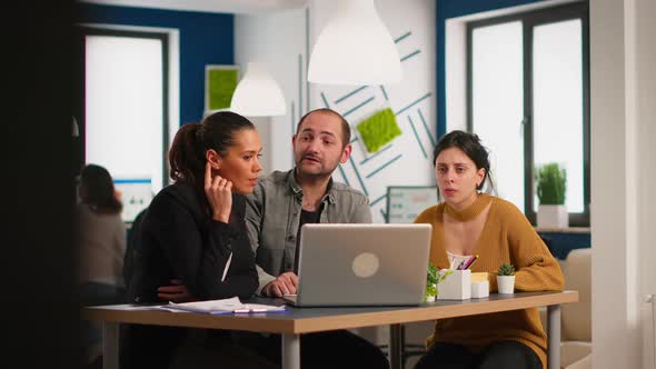 Business Young People Working on Stratup Report Using Laptop alt