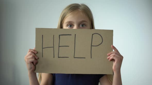 Help Sign in Little Girls Hands, Assault in Family, Childrens Rights Protection alt