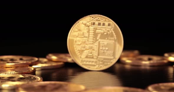 Gold Bit Coin BTC Cryptocurrency Coins on a Black Background alt