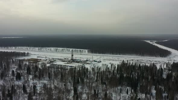 Oil Rig in the Winter in the Forest