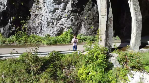 Aerial view from a drone on a road in the mountains. alt