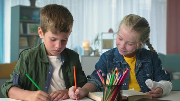 Friendship Two Little Friends Spend Free Time Together at Home Drawing with Colorful Pencils in alt