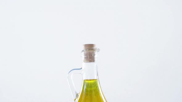 Cooking oil in glass container alt