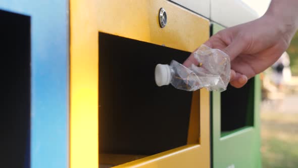 Hold Hand Crush Empty Bottle Crumpled Plastic Garbage Bin Trash Sorting Recycling