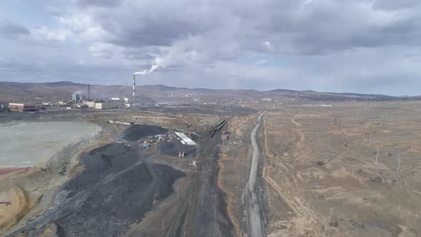 Aerial view of copper plant in Karabash city. Smoke comes out of the chimney 25 alt