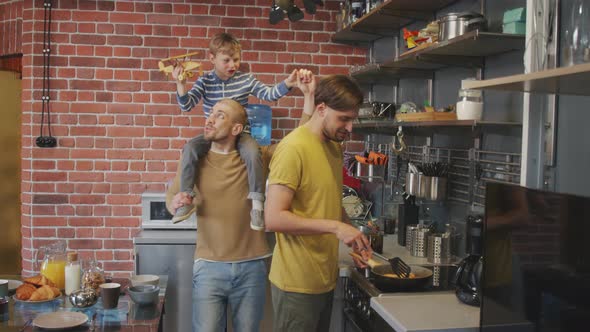 Happy Same-Sex Family with Kid alt