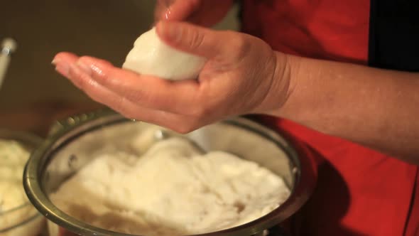 Pupusas making by woman hands close up